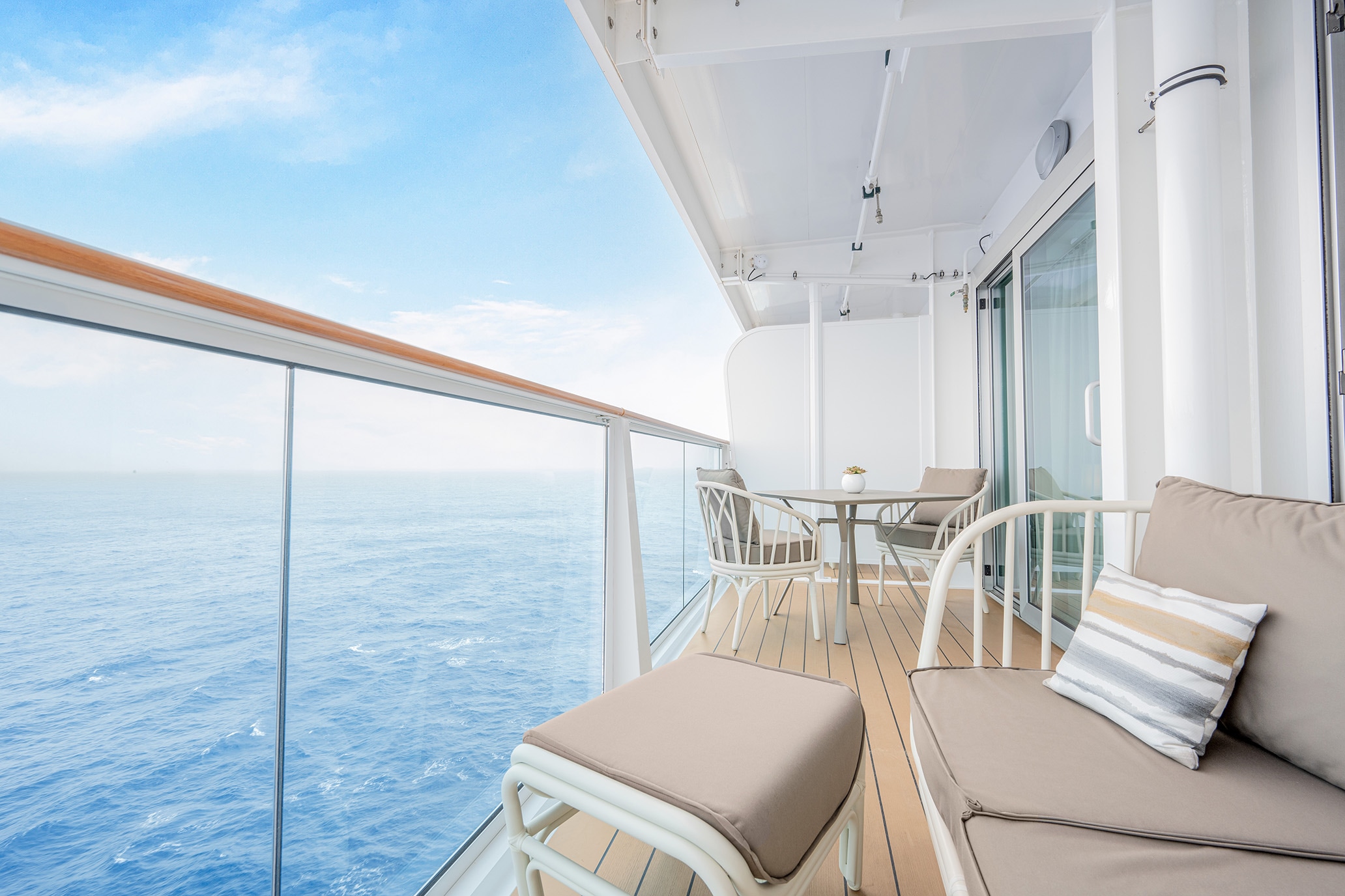 Spacious private balcony with luxury balcony furniture